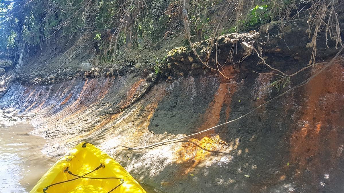 coal ash contaminants seeping into a river