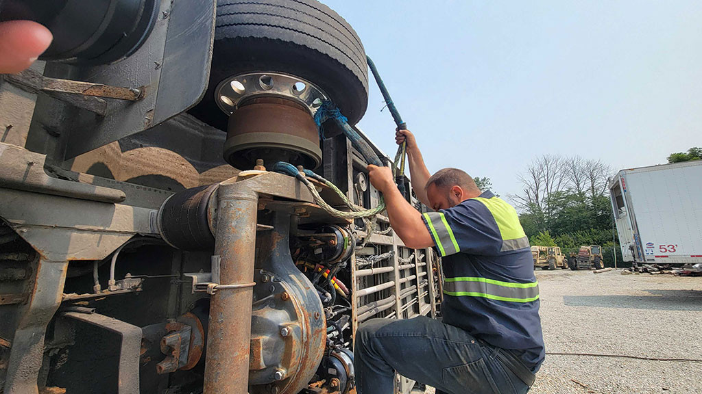 man climb on truck