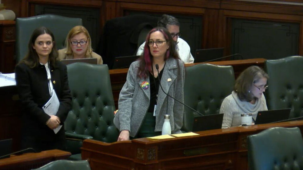 Illinois State Representative Kelly Cassidy (center) spearheaded the passage of Illinois' Reproductive Health Act. She's currently the only openly gay woman serving in Illinois' state legislature.