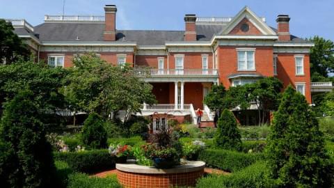 In this Aug. 28, 2014, file photo, landscaping is maintained at the Illinois Executive Mansion in Springfield, Ill. 