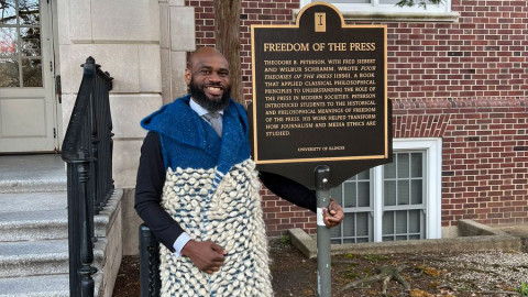 Terrell Star stands outside Gregory Hall at the University of Illinois Urbana-Champaign, where he studied journalism.